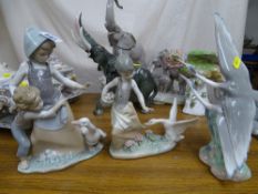 Two Lladro figurine groups, two children and a goose, little girl with basket of eggs and goose