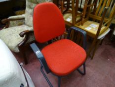 Red upholstered office chair