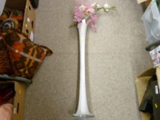 Floorstanding glass vase with artificial flower contents
