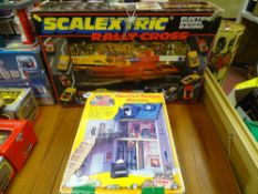 Boxed Scalextric Raleigh Cross set and a Haunted Badger Mansion by Tomy
