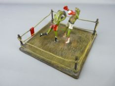 Cold bronze Bergman group of two boxing frogs in a 'boxing ring'