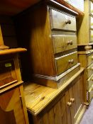 Pine two door cupboard and a small three drawer bedside chest