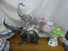 Group of three pottery elephants (damage to one horn), a single pottery elephant and a Continental