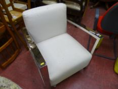 Chrome framed cream upholstered stylish contemporary easy chair