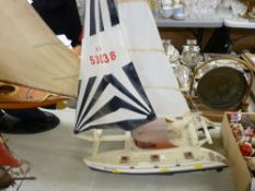 Model of a catamaran with sails entitled 'Mistral'