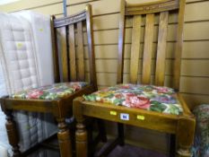 Pair of upholstered splatback chairs