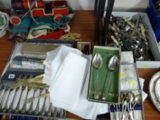 Large parcel of cased and loose flatware and a small quantity of table linen