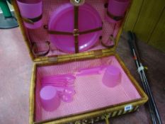 Tidy wicker picnic basket with contents