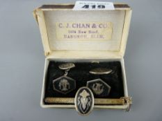 White metal and enamel cufflinks and matching tie pin