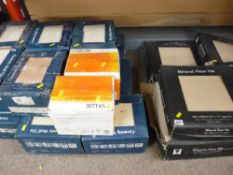 Large quantity of boxed ceramic wall tiles and a quantity of mineral floor tiles