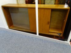 Mid Century slim display cabinet with glazed sliding doors