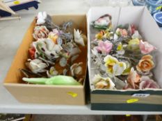 Two boxes of porcelain roses etc