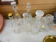 Quantity of decanters with stoppers etc