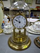 Boule clock under a glass dome