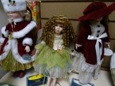 Three porcelain headed dolls with stands, two with certificates from the Porcelain Doll Collection