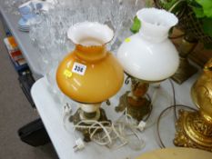 Pair of onyx and brass effect oil type table lamps