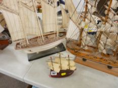 Model yacht on a stand, a model threemaster etc