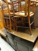 A vintage oak sideboard together with rush seated chairs & an embroidered fire screen