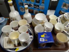 A tray of various Royal commemorative ware including Wade whiskey bells etc