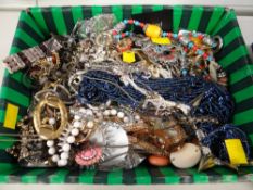 A box of various costume jewellery
