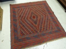 A blue & red patterned Gazhak rug, 123 x 111cms