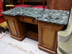 An antique green marble-top breakfront counter-sideboard - 77cms, depth - 59cms, length - 140cms
