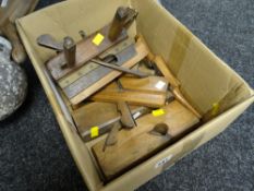 A collection of vintage wood working tools including planes, spirit levels etc