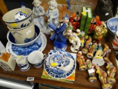 A tray of vintage ceramic clowns, bookends, blue & white china