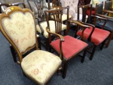 Two antique mahogany dining / hall armchairs with cushion seats together with an antique mahogany