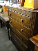 A vintage 'Fyne Lady' oak chest of five drawers together with a matching dressing table