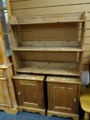 A pair of pine single-door bedside cabinets, pine waterfall bookcase
