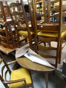 A good vintage 1970s G-plan style circular extending dining table together with six (2+4) ladder