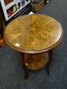 A lovely antique marquetry walnut two-tier occasional table of circular form, the top with marquetry