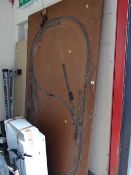 A large model train display board with some track