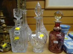 Collection of quality decanters including an etched ruby glass