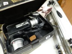 A vintage cased Canon Super 8 auto zoom camera & tripod stand