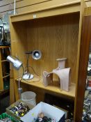 A modern narrow light oak bookcase