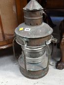 A metal & glass mast head lamp