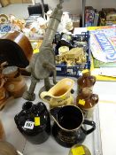 A vintage bar mounted table corkscrew, water jugs etc