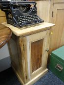 A pine pot cupboard