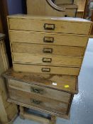 A small five-drawer oak document chest together with a small two-drawer brass handled oak desktop