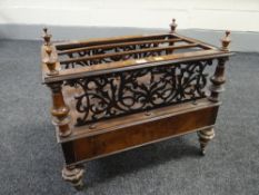 An antique walnut Canterbury