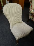 An nicely upholstered bedroom / nursing chair