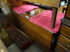 A George III circa 1800 mahogany drop leaf dining table