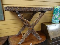 A profusely carved mahogany with leaves & bamboo effect edging Asian butler's tray with a Royal