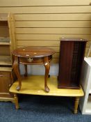 A pine Long John coffee table, mahogany effect circular coffee table, CD storage unit