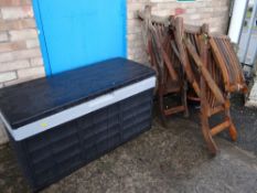 Two teak garden recliners together with a garden storage box etc (outside)