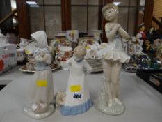 Two Nao figures together with another similar