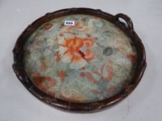 An Oriental silk work tray