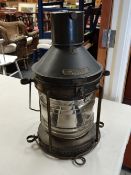 A metal & glass masthead lamp